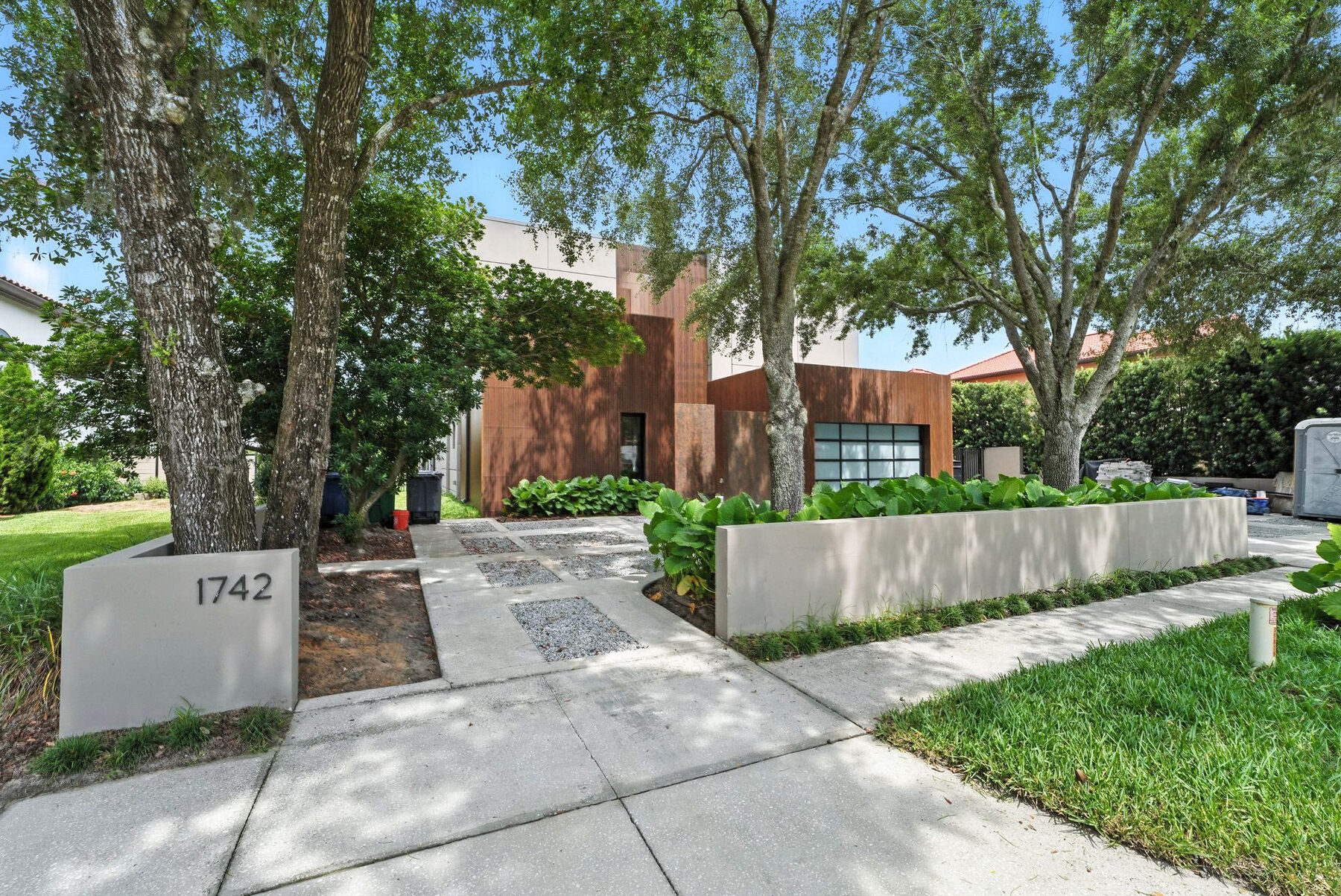 Exterior Re-facing — completed façade transformation, street view